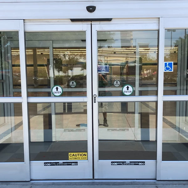 Automatic sliding glass doors