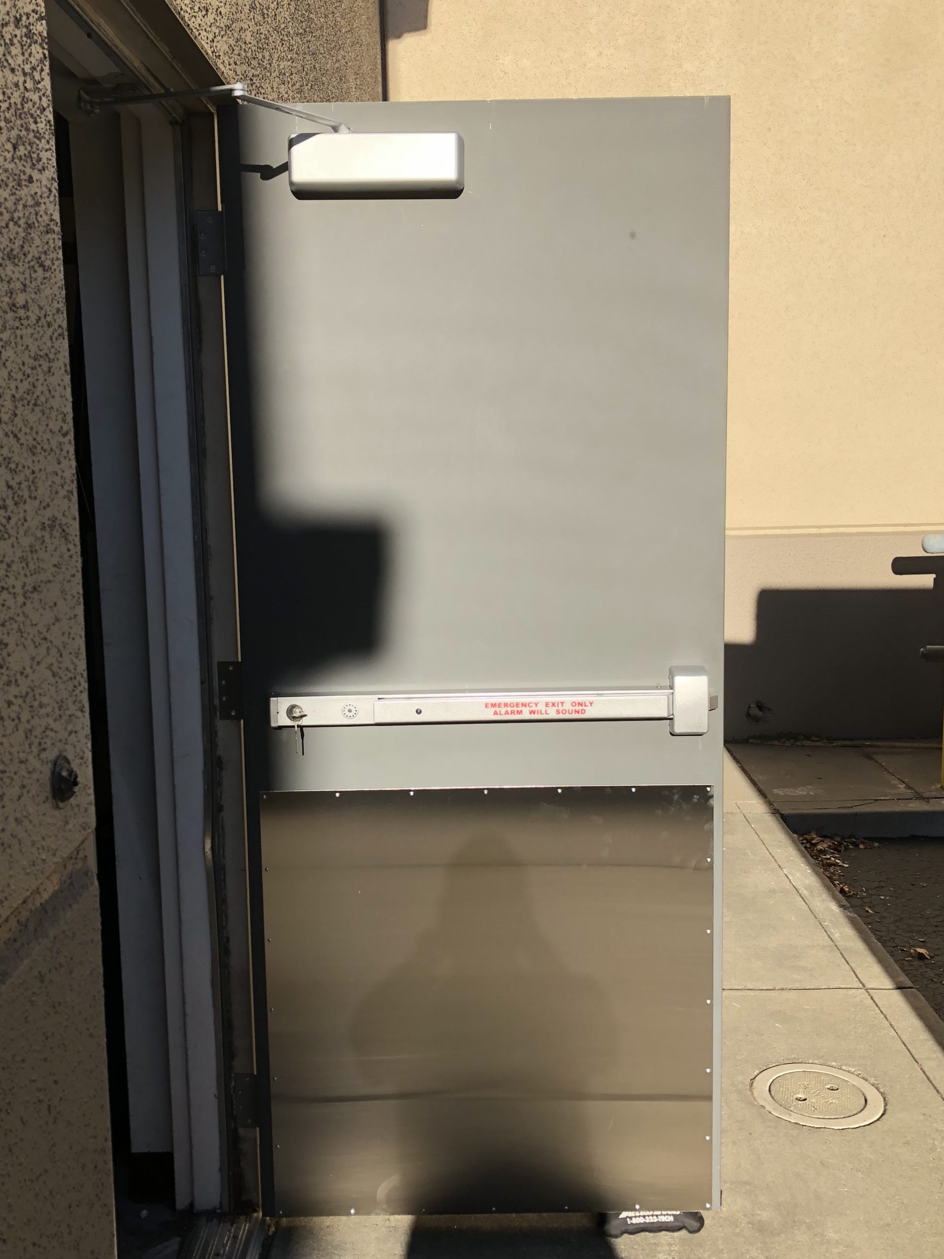 commercial exterior door installed to back of retail property