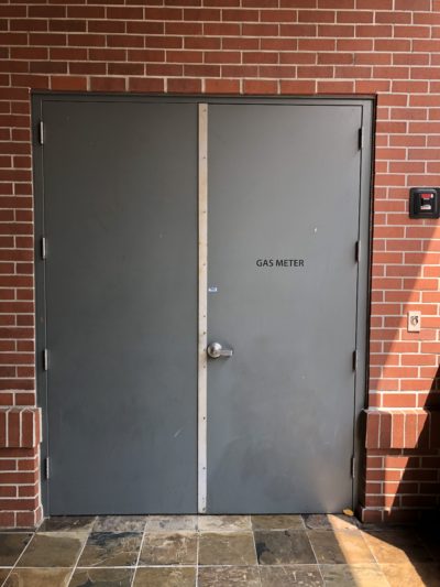commercial door installed to brick building in plymouth ca