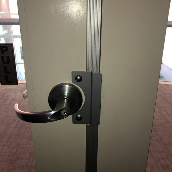 Door handle and lock replaced by commercial locksmith