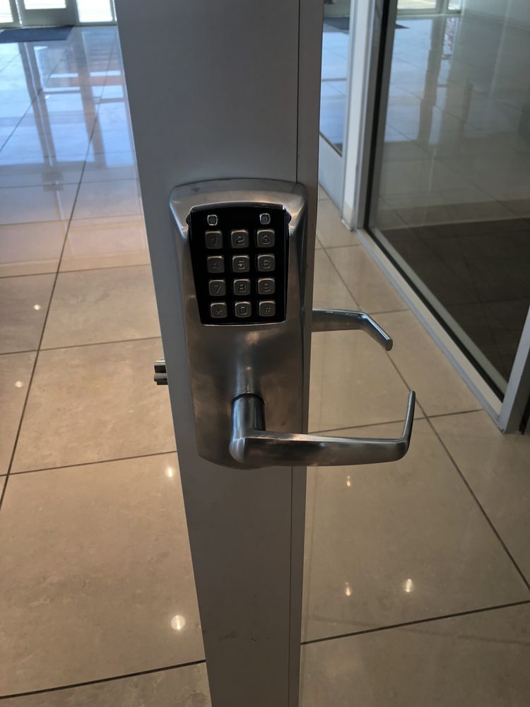 keyless lock installed on a commercial glass door in Oakland