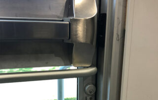 how do you fix a commercial door that won’t latch?