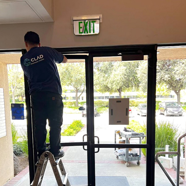 one of our pros is working on a commercial door repair Ripon, California